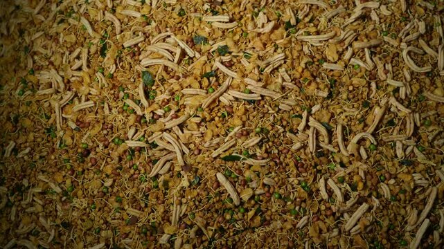Making of Bengali spicy food chanachur.