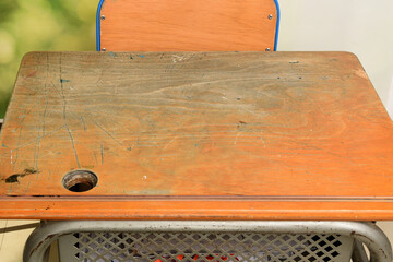 old school desk made of used wood