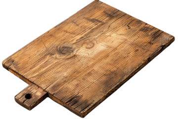A rustic wooden cutting board invites culinary creativity in a warm kitchen