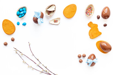 Frame of chocolate Easter eggs, top view. Festive concept