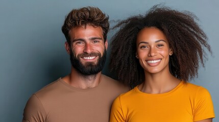 A smiling couple poses closely together, showcasing their joyful expressions and carefree spirits in a natural outdoor setting, highlighting love and connection.