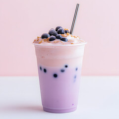 Purple milk tea with popping boba and granola topping