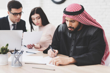 Arabic family in office.