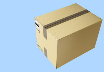 A sealed cardboard shipping box with a label and black tape on top, placed against a light blue background, ready for delivery or transportation 3d image