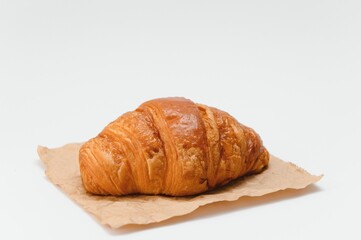 fresh croissant on white background