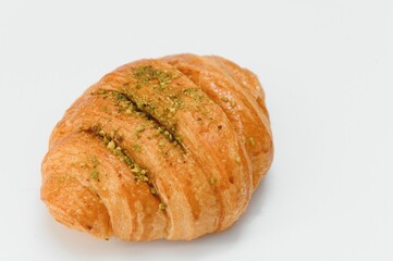 fresh croissant on white background