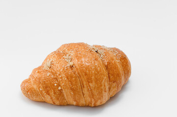 fresh baked croissant isolated on white background