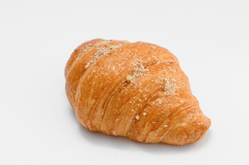 fresh baked croissant isolated on white background