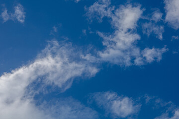 Clear Blue Sky with Wispy White Clouds
