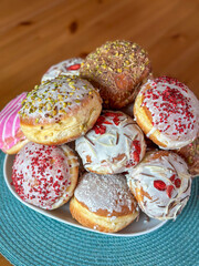 Multicolored Donuts on Plate Close-up