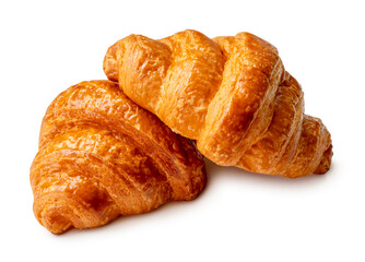 Side view of two brown or golden loaves of croissants in stack or heap isolated on white background with clipping path