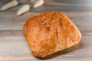 Pastries on a wooden background