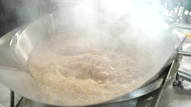 Making of Bengali spicy food chanachur.