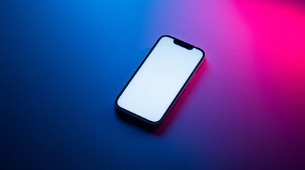 Smartphone with blank screen rests under neon blue and pink light