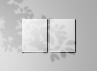 Two Blank White Cards with Leaf Shadows on Gray Background