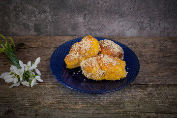 Romanian mucenici from Moldova region: figure eight shaped sweet bread, sprinkled with honey and...