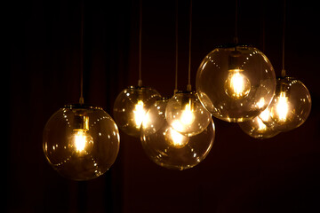 Hanging lamps in a dark background