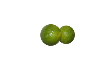 isolated lemons. green natural food. two green fruits.