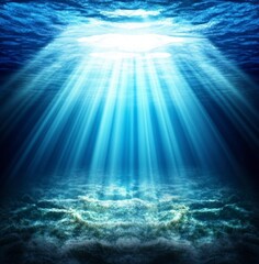 Naklejka premium Underwater scene with sunbeams piercing through the dark blue water, illuminating the sandy ocean floor. 