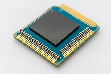Microprocessor with gold pins on a circuit board, showcasing detailed engineering and design elements in technology