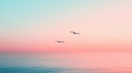 Fototapeta premium Serene Seascape with Seagulls Against a Pink and Blue Horizon