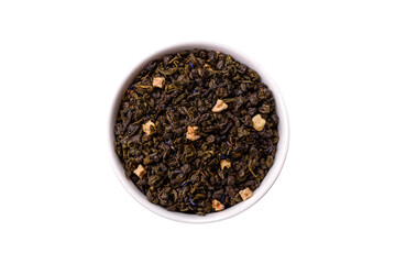 Dry green tea with soursop piece, knapweed petals in bowl