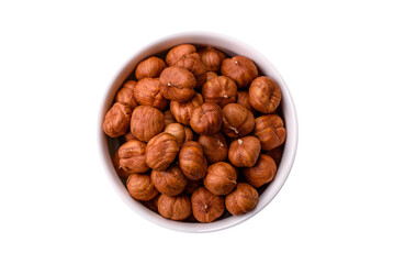 Raw hazelnuts without shells in a bowl