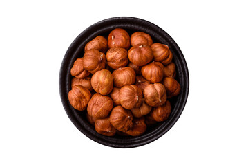 Raw hazelnuts without shells in a bowl