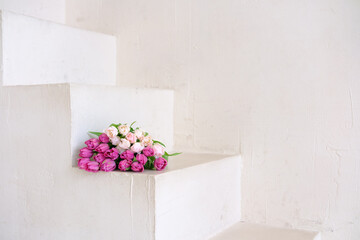 Elegant Tulip Bouquet on Minimalist White Stairs