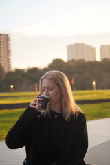 woman drinking coffee