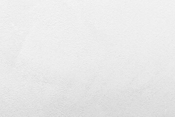 Dirty white concrete wall texture background. Uneven render stucco white painted concrete wall texture background. Rough and grunge wall in the sun.