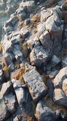 Rocky outcroppings with jagged edges create a dramatic landscape in a rugged wilderness setting at sunrise