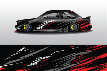 Obraz premium Sleek black racing car with dynamic red and white graphics, showcasing speed and style
