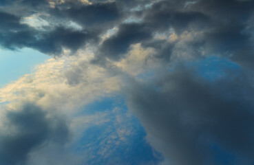 Obraz premium A panoramic view of the sky with swirling clouds creates a sense of infinity. Symbolizes freedom and the unpredictability of life.