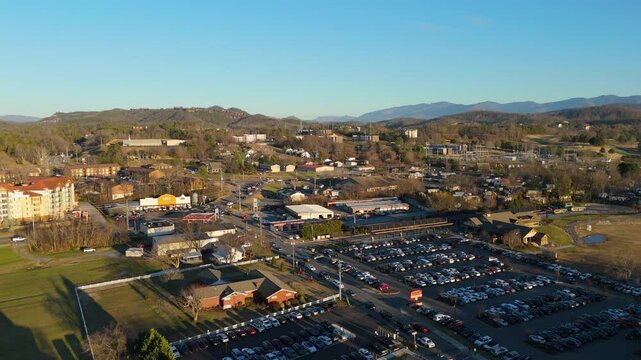 Static aerial shot of Piegon Forge, TN at sunset.