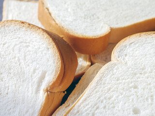 Close-up of freshly sliced ​​soft and fragrant bread with white bread,brown bread crust macro