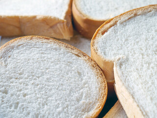 Close-up of freshly sliced ​​soft and fragrant bread with white bread,brown bread crust macro
