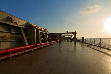 View of the main deck of a bulk carrier ship underway at sea