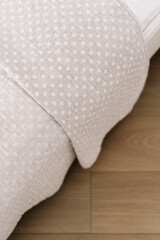 Cozy bedroom with modern design featuring a comfortable bed and natural light