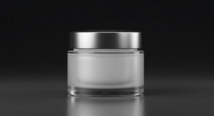Frosted glass cream jar with silver lid on dark background  