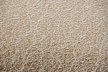 Close-up of wet sand and dust conditions on a white car in the summer.