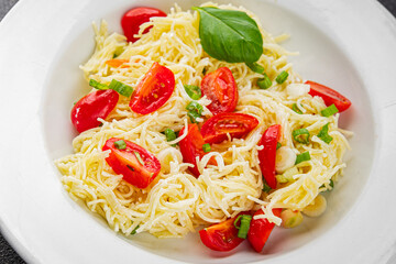 Pasta with tomatoes vermicelli vegetables dish fresh delicious gourmet food background on the table rustic food top view copy space