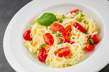 Pasta with tomatoes vermicelli vegetables dish fresh delicious gourmet food background on the table rustic food top view copy space