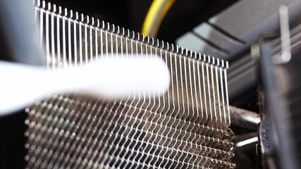 Cleaning dust from computer radiator for better cooling performance