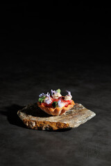 haute cuisine concept dish sweet tartlet dessert on a stone background 