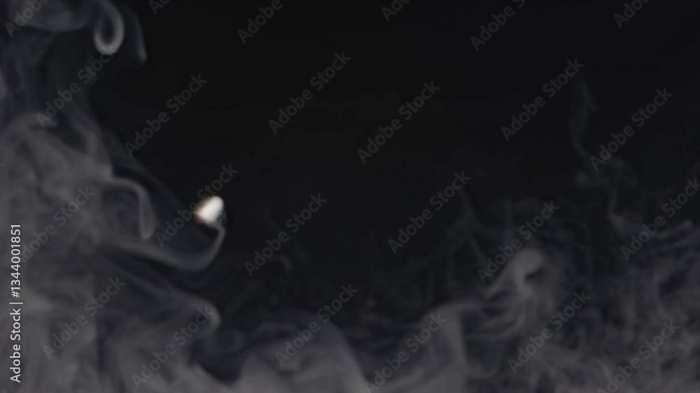 Aufkleber a close-up view of a black color fabric texture, showcasing its softness and depth in a dimly lit en