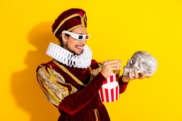 Humorous portrayal of a medieval nobleman enjoying modern cinema in a colorful parodic setting