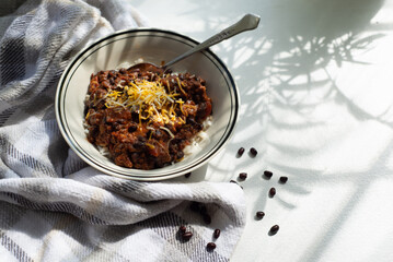 Bowl of chili in a sunny window