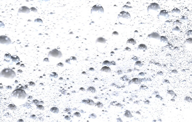 Abstract background of white bubbles. Perfect for cosmetics, cleaning, or spa themes.