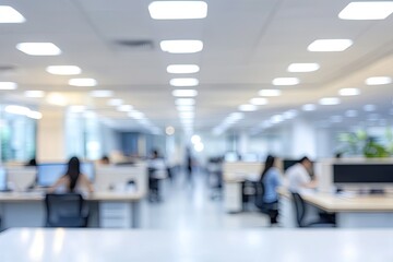 Fototapeta premium Contemporary corporate workspace with blurred office cubicles and soft bokeh lighting, light-filled modern business environment with motion blur effect.